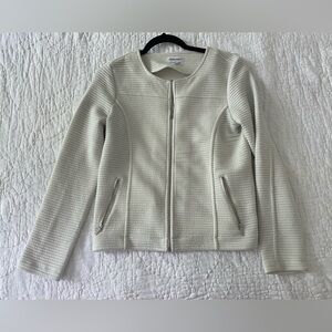 White Calvin Klein zip up jacket.